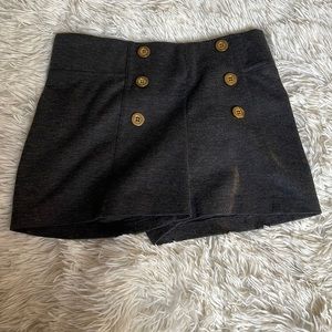 Gray high waisted shorts with gold buttons